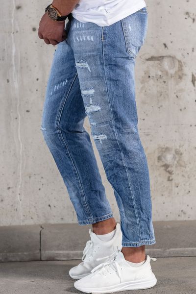 Ljusblå jeans för män med trasigt rippat stentvättat tyg