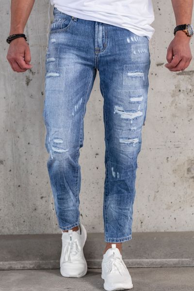 Ljusblå jeans för män med trasigt rippat stentvättat tyg